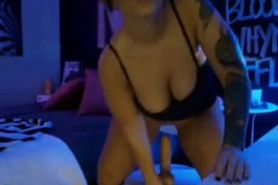 Goth Brunette Chick Rides and Sucks A Dildo On Cam