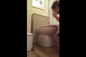 dirty bitch licking the toilet bowl
