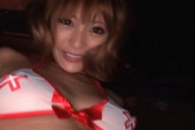 Sexy Japanese nurse flashes her hairy pussy in close-up